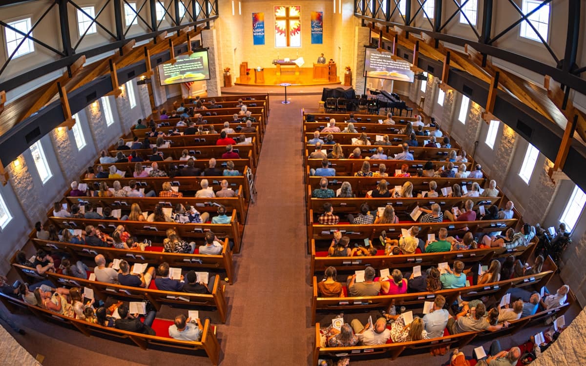 Congregation worshipping during a church service